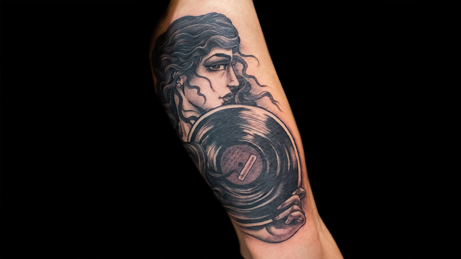 Vinyl Girl Head Tattoo by Justin Weatherholtz | Kings Avenue Tattoo